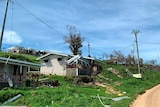 A house is damaged from Cyclone Harold on the island of Santo in Vanuatu.