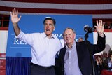 Mitt Romney and Jack Nicklaus wave during a campaign rally in Westerville, Ohio.