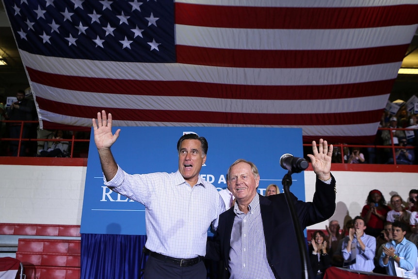 Mitt Romney and Jack Nicklaus wave during a campaign rally in Westerville, Ohio.