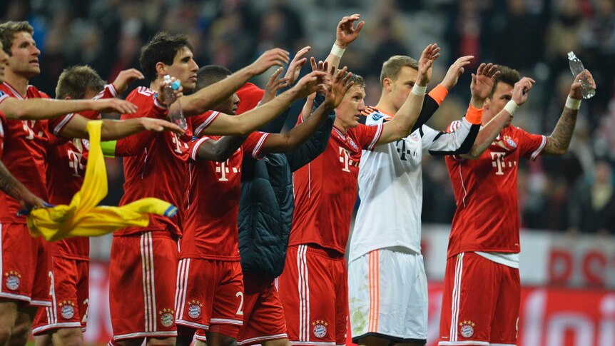 Bayern Munich players celebrate Champions League quarter-final berth