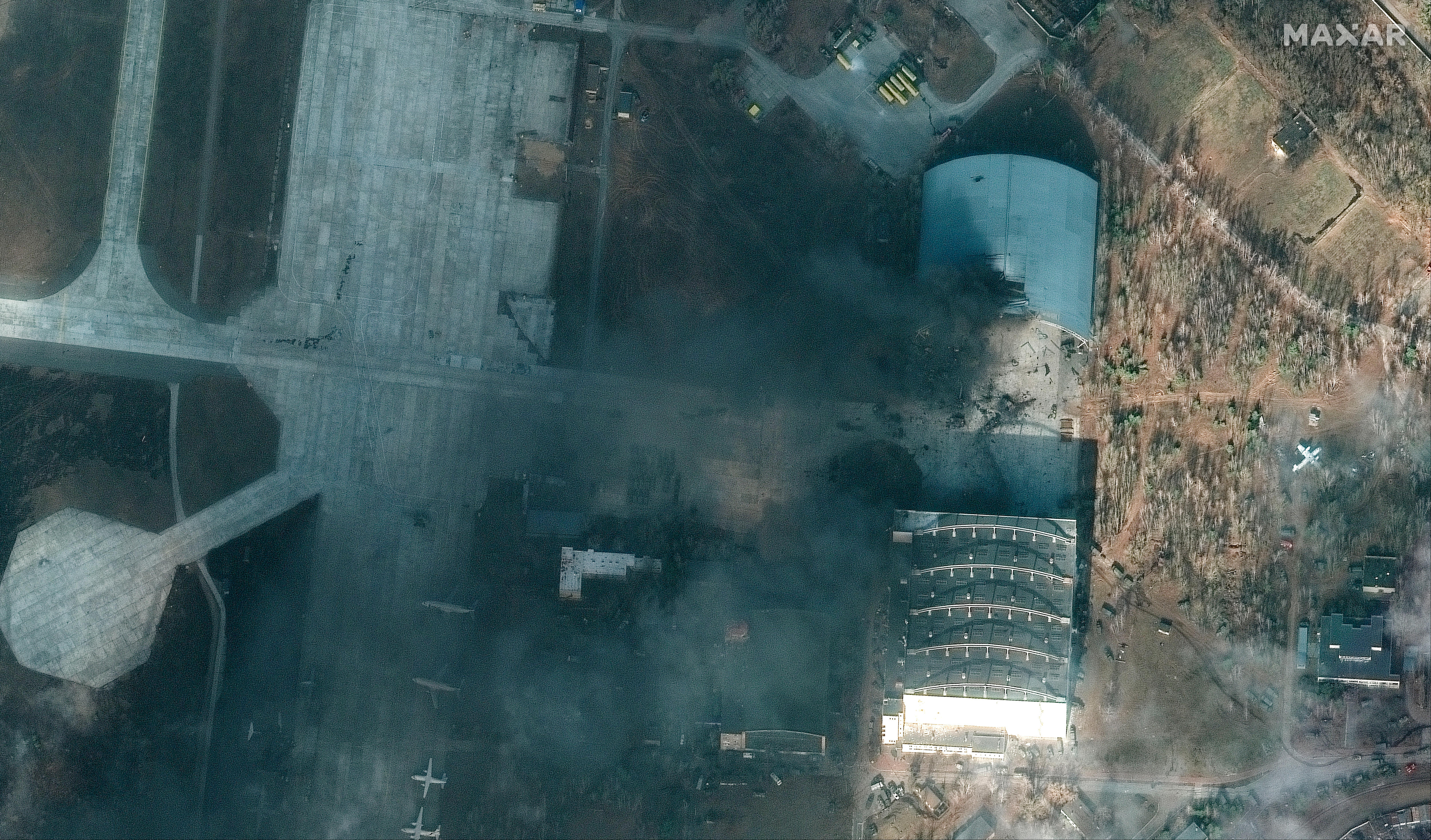 Satellite image showing damage to buildings at an airport in Ukraine.