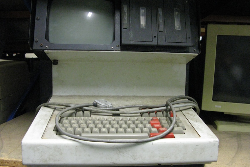 An old computer and keyboard.