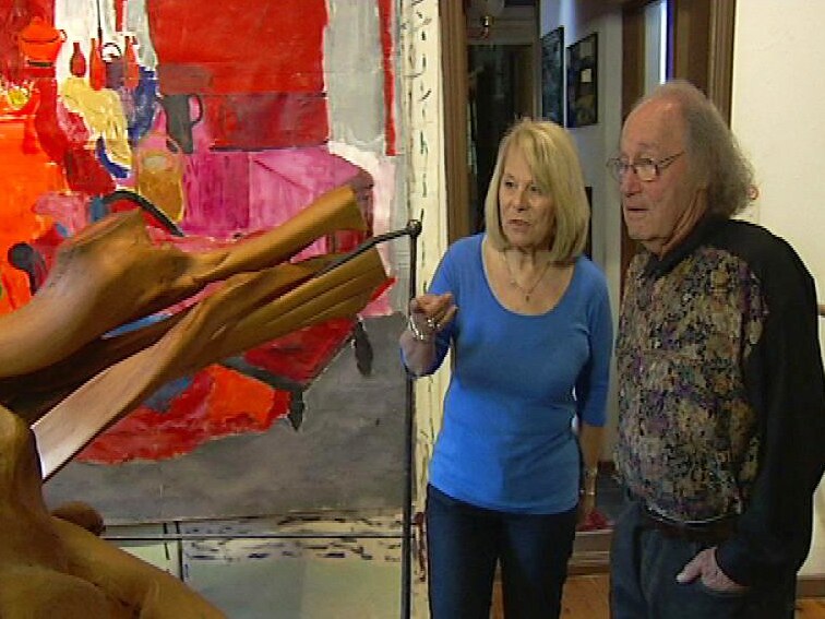 Holocaust survivors Eva Temple and Andrew Steiner with artworks