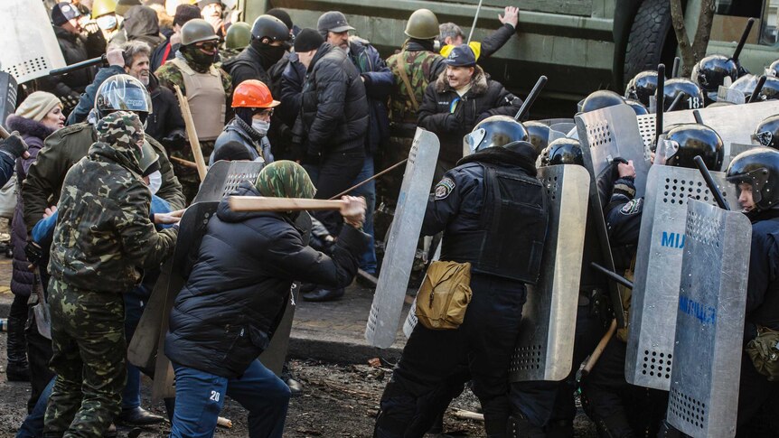 Protesters and police clash in Kiev, Ukraine.