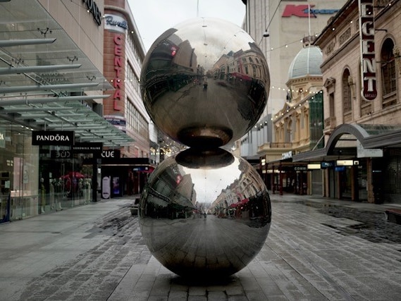 Two silver balls and an empty pedestrian mall
