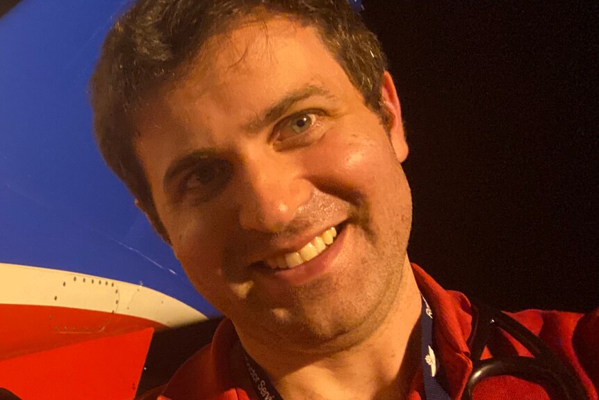 Close up selfie of Marco Giuseppin smiling.