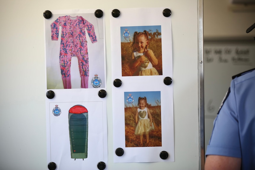Pictures on a whiteboard of cleo smith, pyjamas, and a sleeping bag
