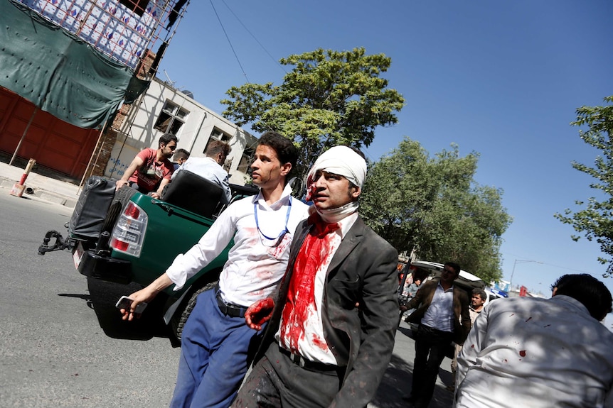 An injured man arrives to a hospital after a blast in Kabul, Afghanistan May 31, 2017.