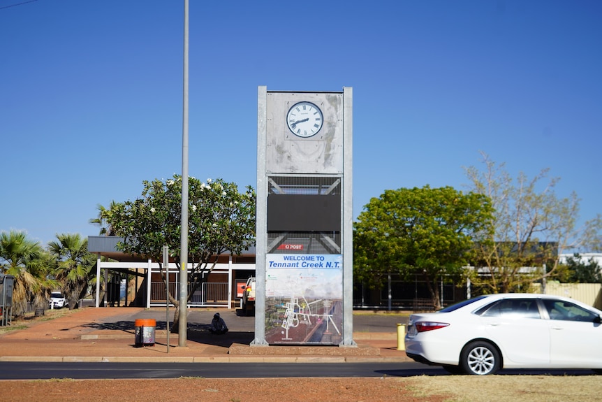 A clock on a street in the CBD of a regional town.