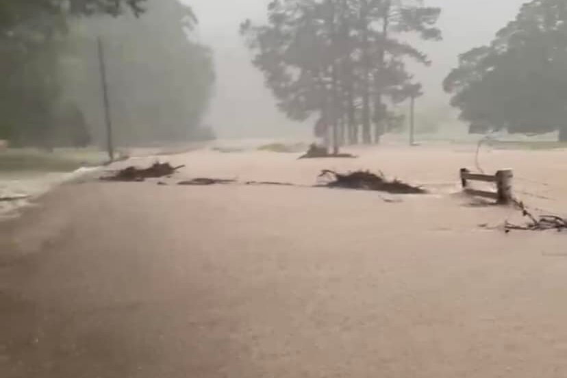 Flood water across road