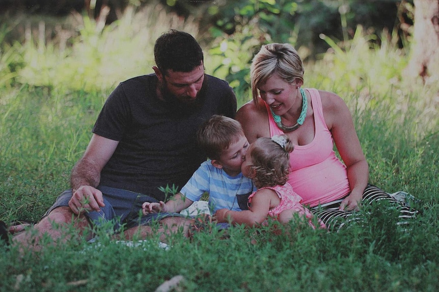 Alyssa and Grant Foster with their two children before their third child was born