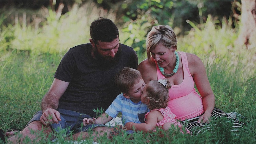 Alyssa and Grant Foster with their two children before their third child was born