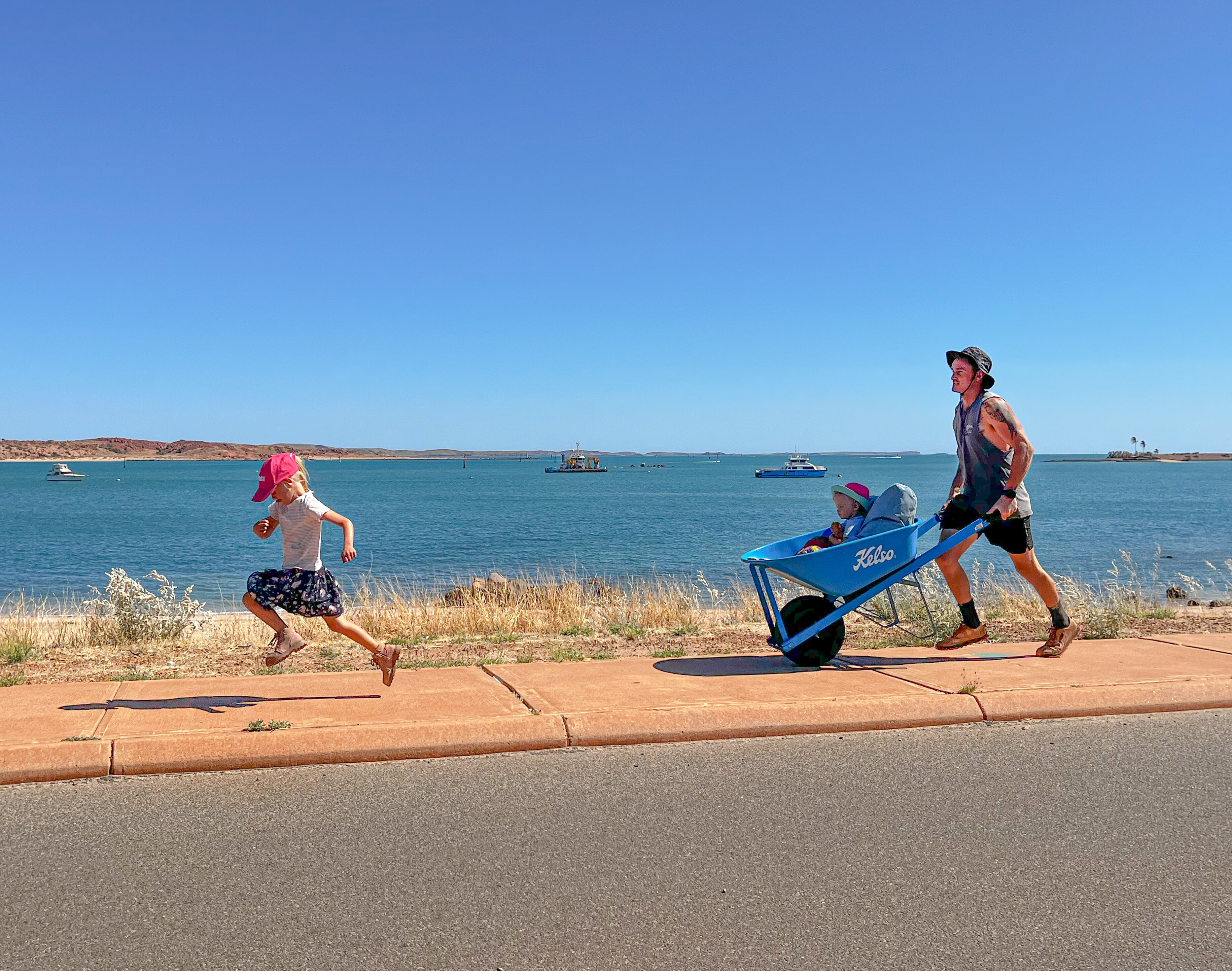 Fremantle dad to run 500km while pushing his daughters in a wheelbarrow ...