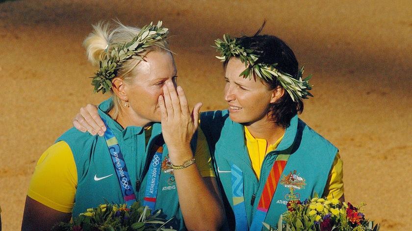 Tanya Harding (L) weeps after the Australian softball team lost to the USA at Athens 2004.