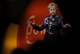Hillary Clinton speaks on stage.