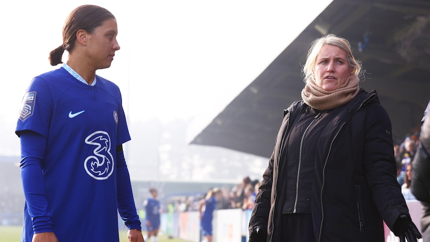 Chelsea player Sam Kerr with coach Emma Hayes on the sideline of a Women's Super League match with Liverpool that was called off