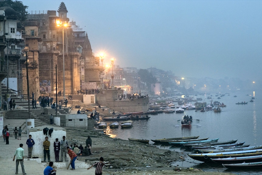 People play cricket alongside the River Ganges in Varanasi