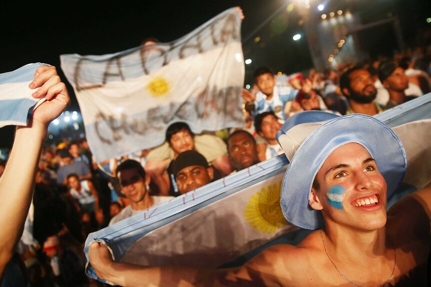 Argentina fans celebrate on Copacabana beach in Rio on June 15, 2014.
