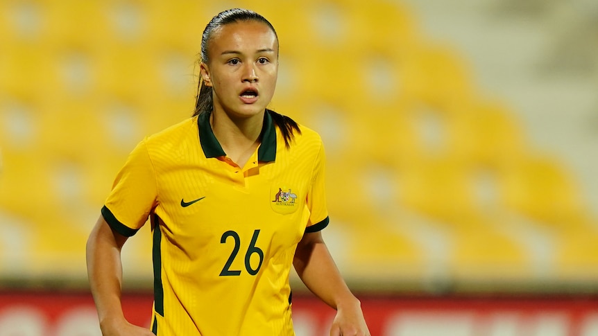 Amy Sayer in a Matildas shirt