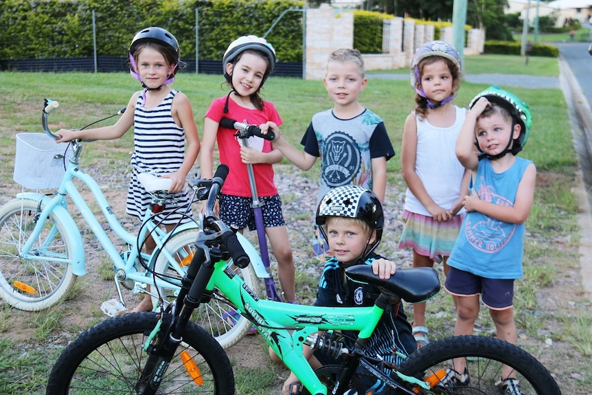Mayla Ward (back left) with her neighbourhood friends in their Caboolture suburb.