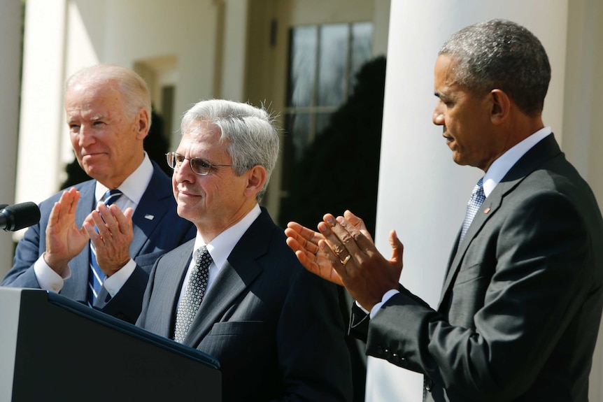 U.S. President Barack Obama applauds Judge Merrick Garland