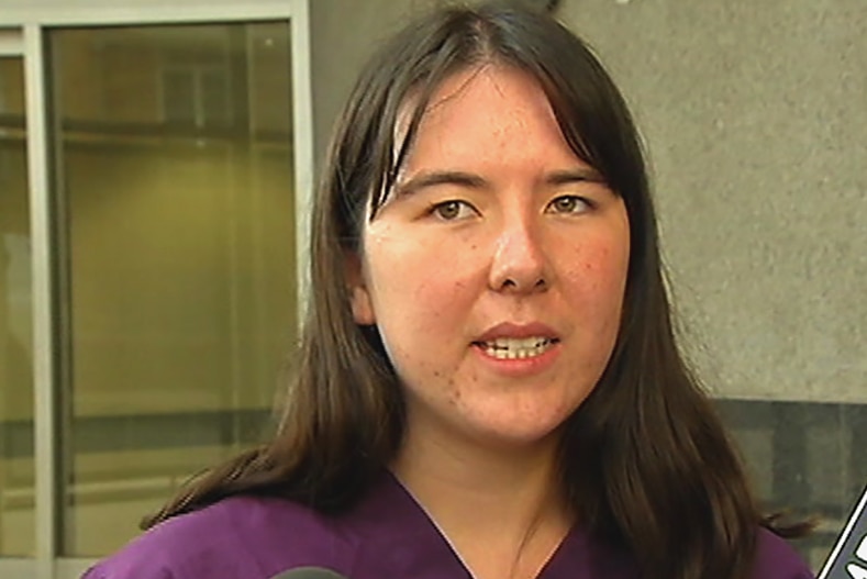 A young woman speaking to the media outside Brisbane Magistrates Court