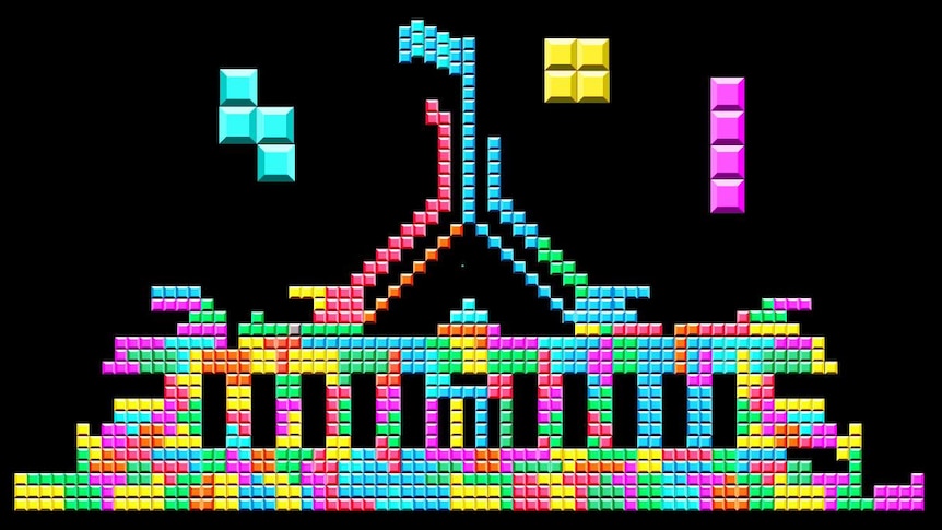 Brightly coloured Tetris-style tiles make up a graphic in the shape of Australia's Parliament House, against a black background