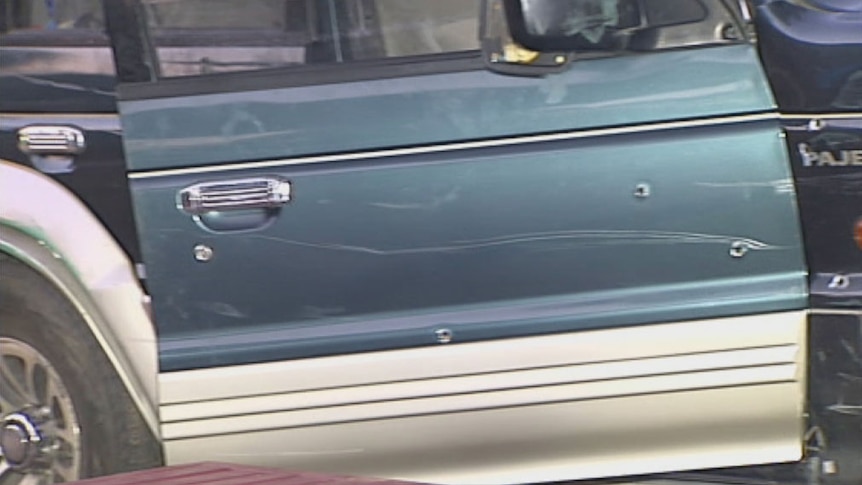 Bullet holes in a car a Holland Park, Brisbane.