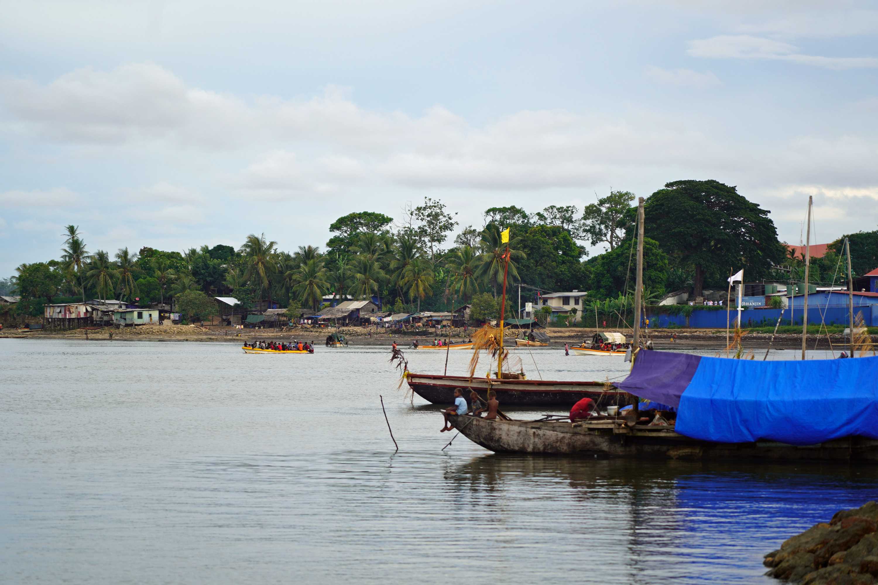 Boats near the shore at Daru Island.