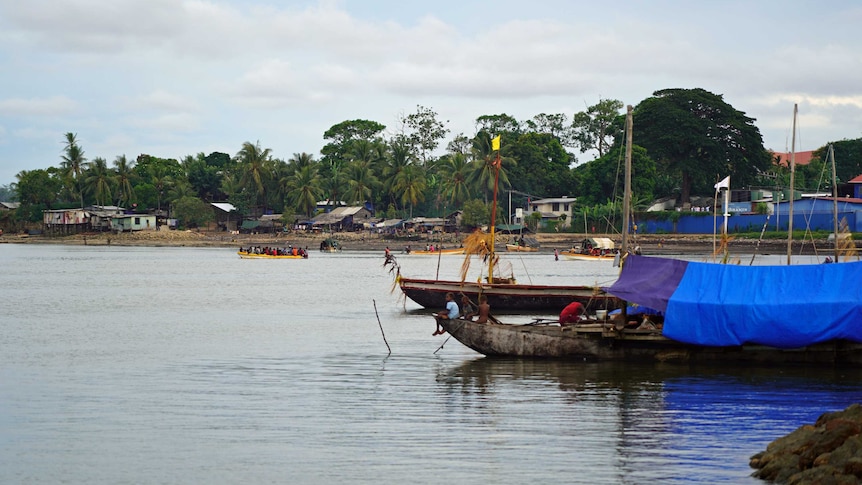 Boats near the shore at Daru Island.
