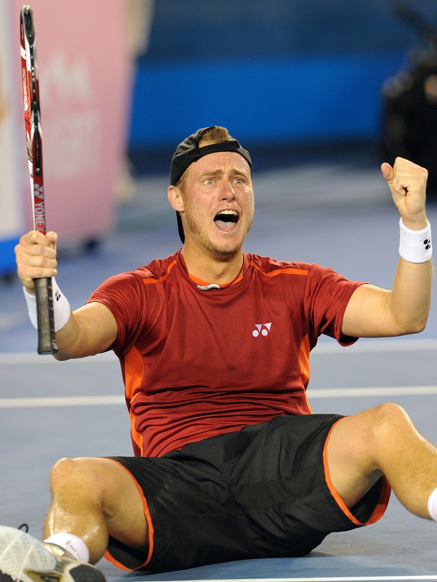 Roll on: Lleyton Hewitt yet again victorious on Rod Laver Arena.