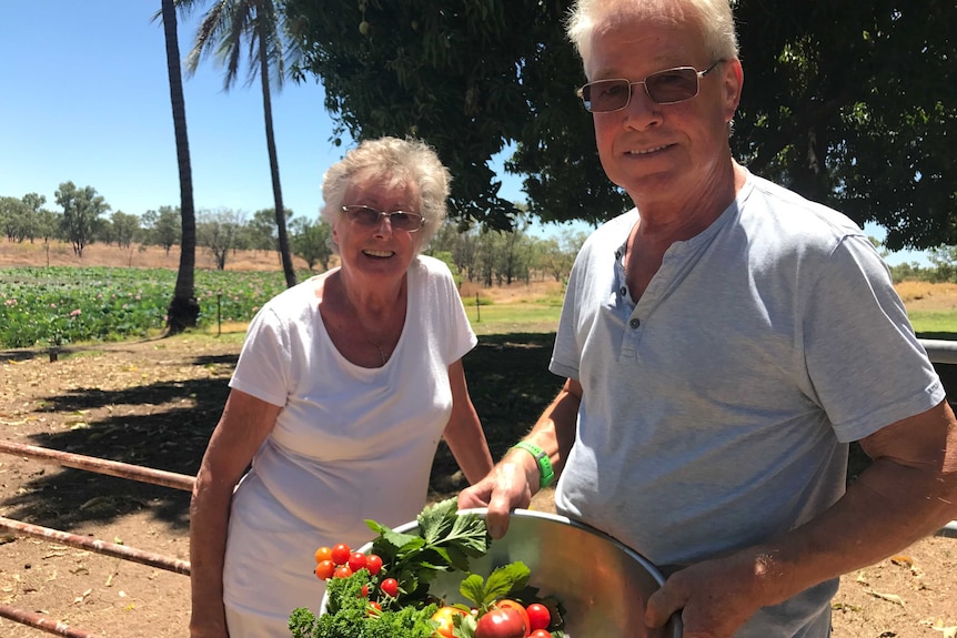 Anita and Jens Steffen with fresh-grown produce on Abingdon Downs.