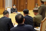 Kim Jong-un at an emergency meeting of the Workers' Party of Korea Central Military Commission.