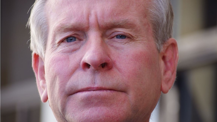 Close-up of WA Premier Colin Barnett, looking straight ahead