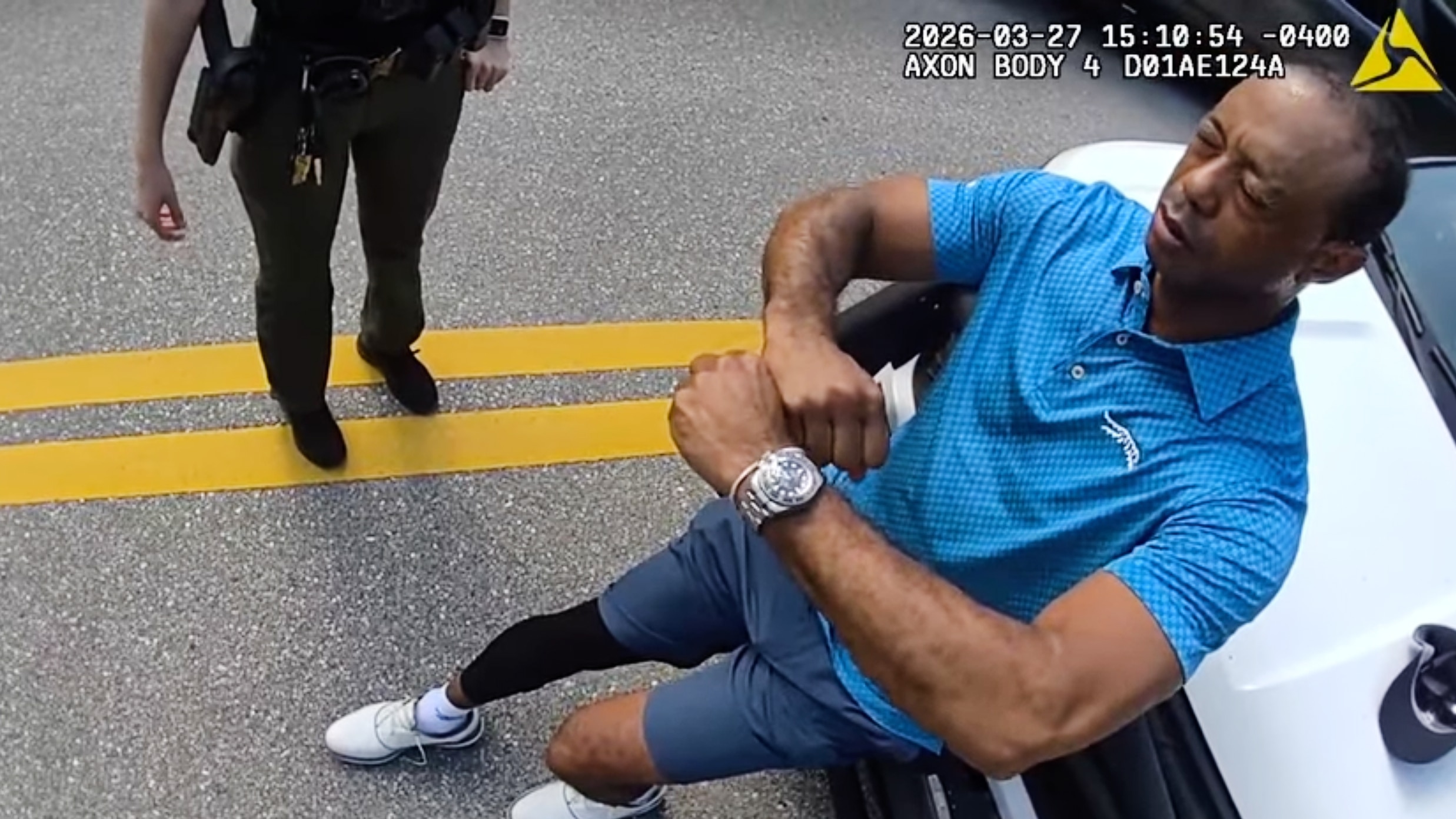 Police release body cam footage showing Tiger Woods stunned over arrest