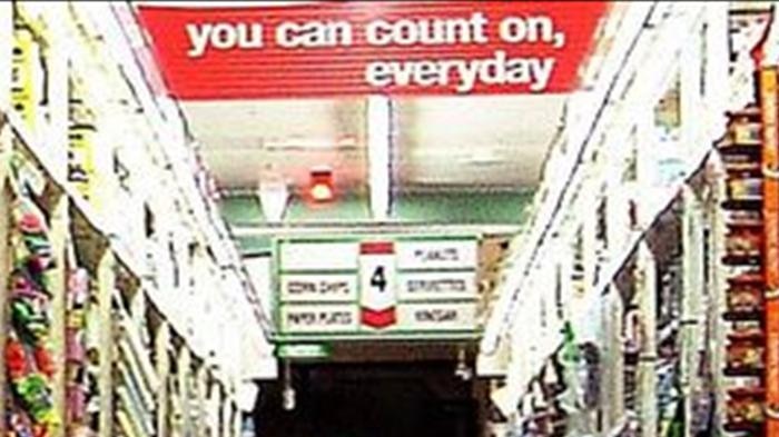 A shopper browses shelves