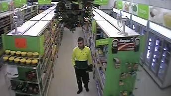 Police say the man entered the Higgins shop around 10:30am AEDT and threatened staff with a knife before fleeing with cash.