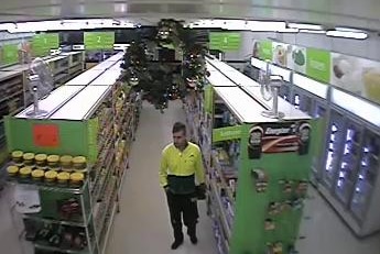 Police say the man entered the Higgins shop around 10:30am AEDT and threatened staff with a knife before fleeing with cash.