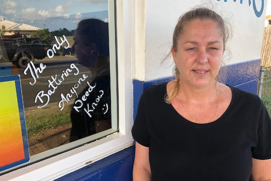 Battered Wife fish and chip shop owner Carolyn Kerr stands outside her shop.