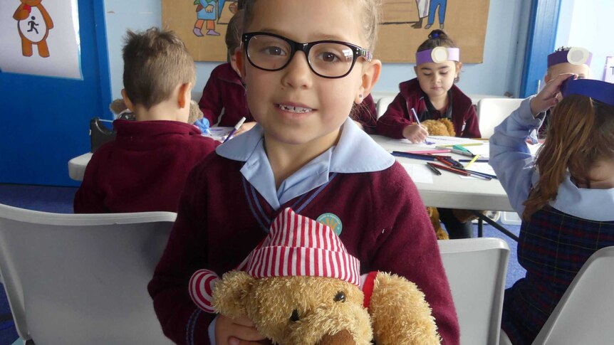 Aliera Denholm with teddy Mr Snuggles