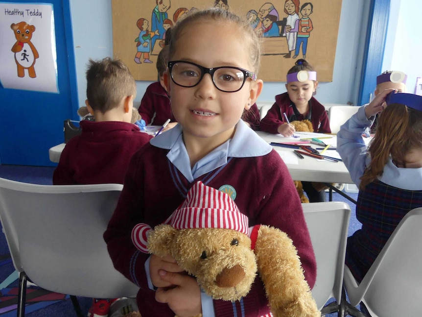 Aliera Denholm with teddy Mr Snuggles