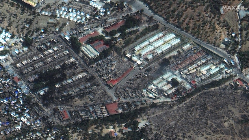 A burned-down refugee camp is seen on a satelite image