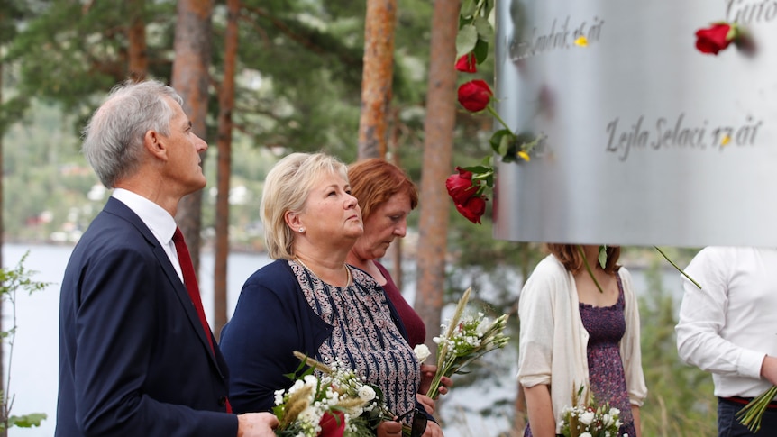 Norway's Prime Minister Erna Solberg attend a memorial service
