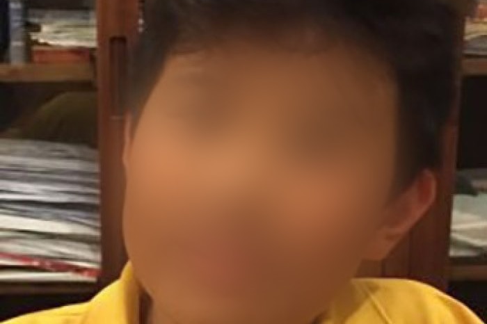 blurred headshot of a boy