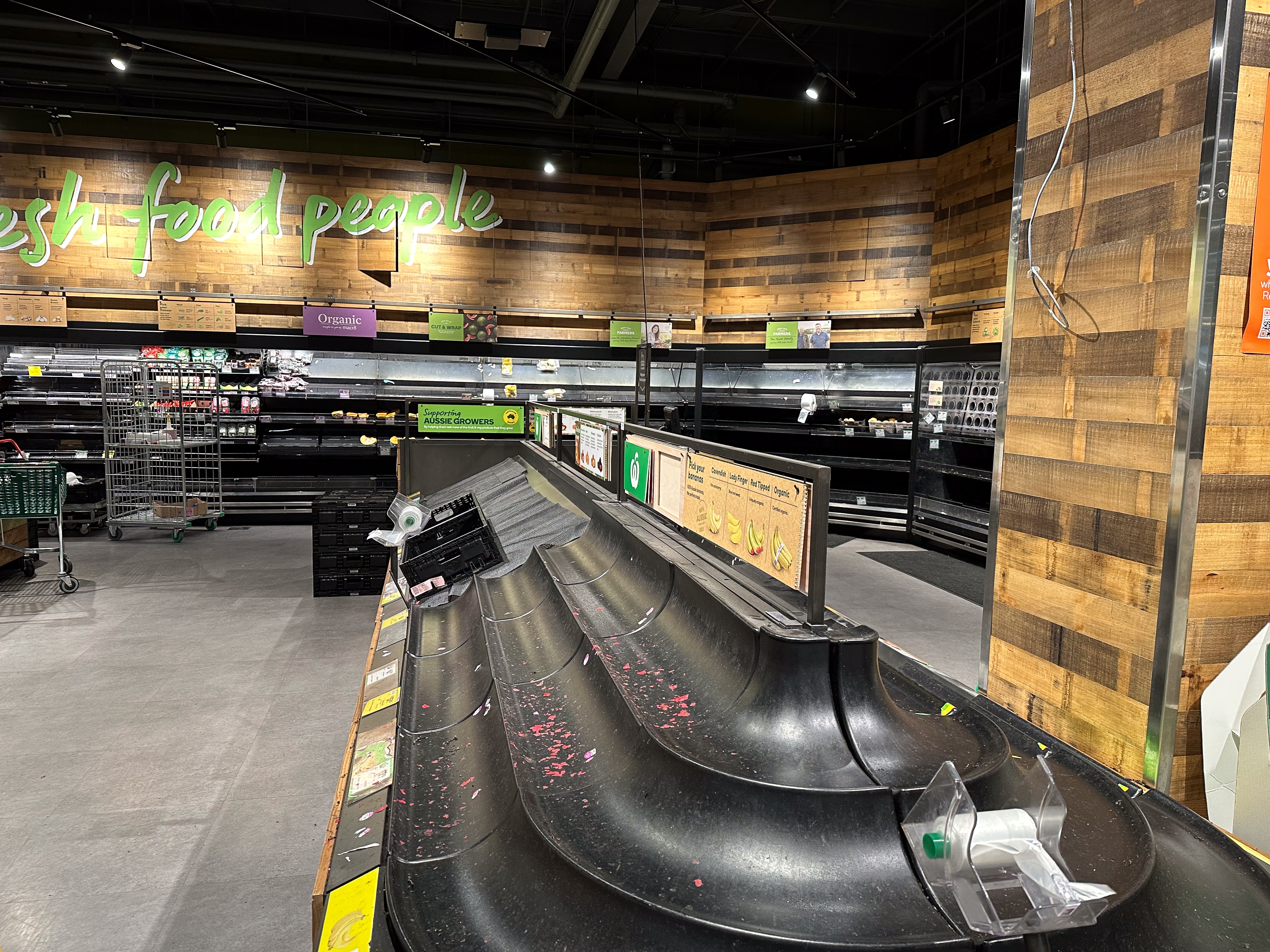 Almost bare shelves in a supermarket