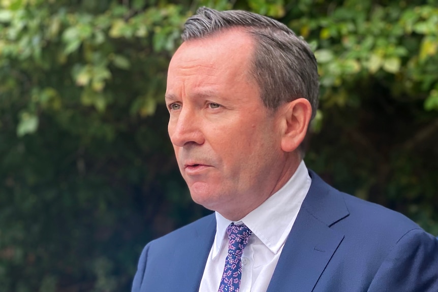 A head and shoulders shot of WA Premier Mark McGowan speaking in a media conference outdoors.
