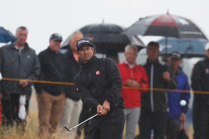Adam Scott of Australia hits a ball onto the 15th green at the British Open on July 20, 2018.