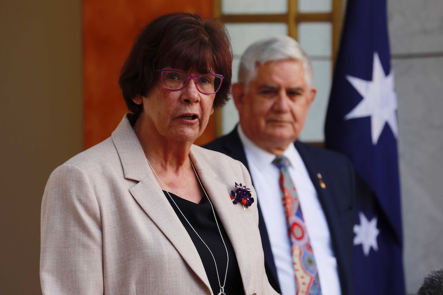 Pat Turner stands in the foreground with Ken Wyatt behind her.