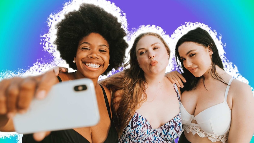 Three friends wearing bikinis pictured smiling for a selfie to depict how to make swimwear shopping less stressful.