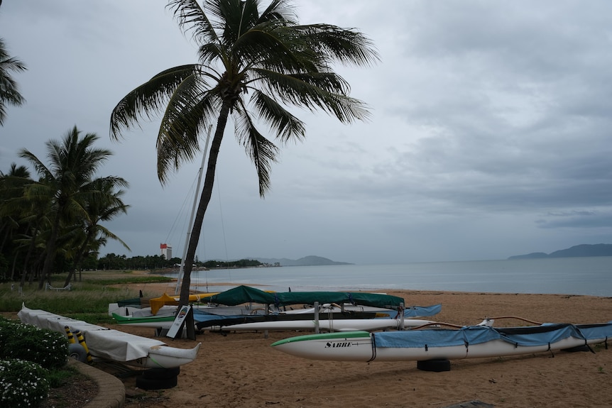 Boating equipment is stacked up on a Townsville beach